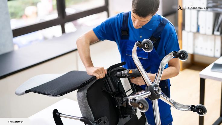 Technician performing office chair gaslift repair in Bangalore